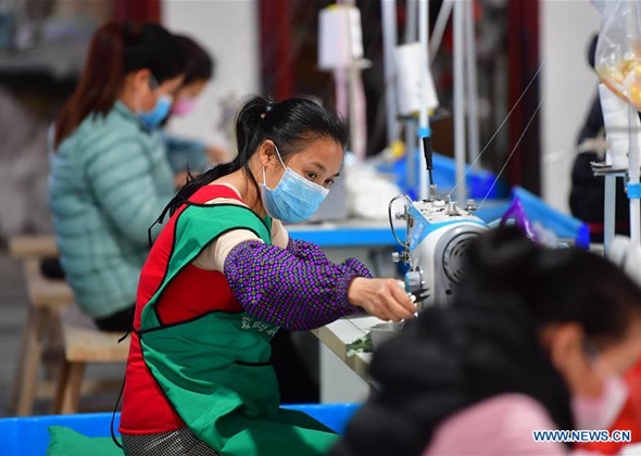 Poverty Alleviation Workshops Engage in Mask Production in G